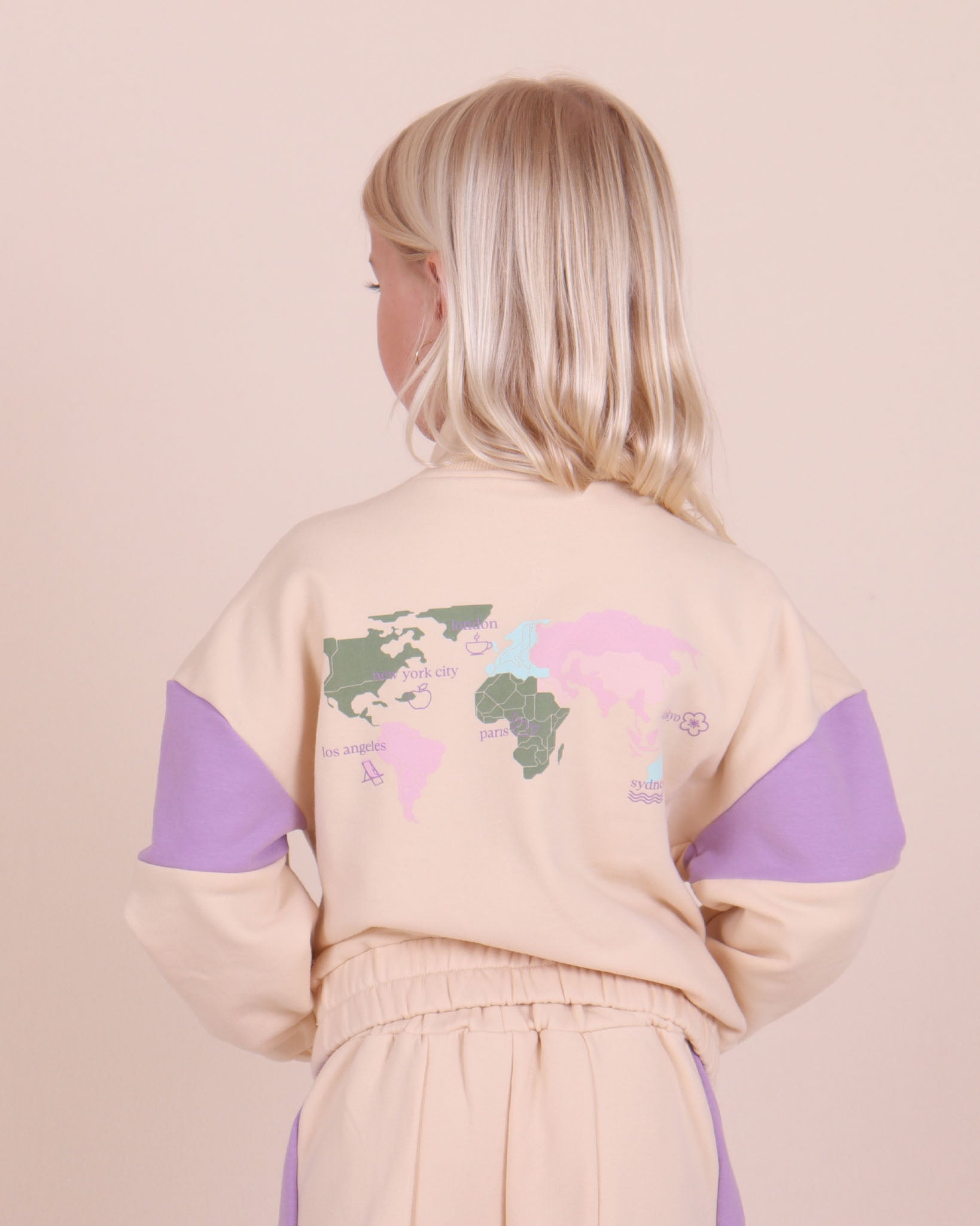 Sweat-shirt lilas à col montant zippé