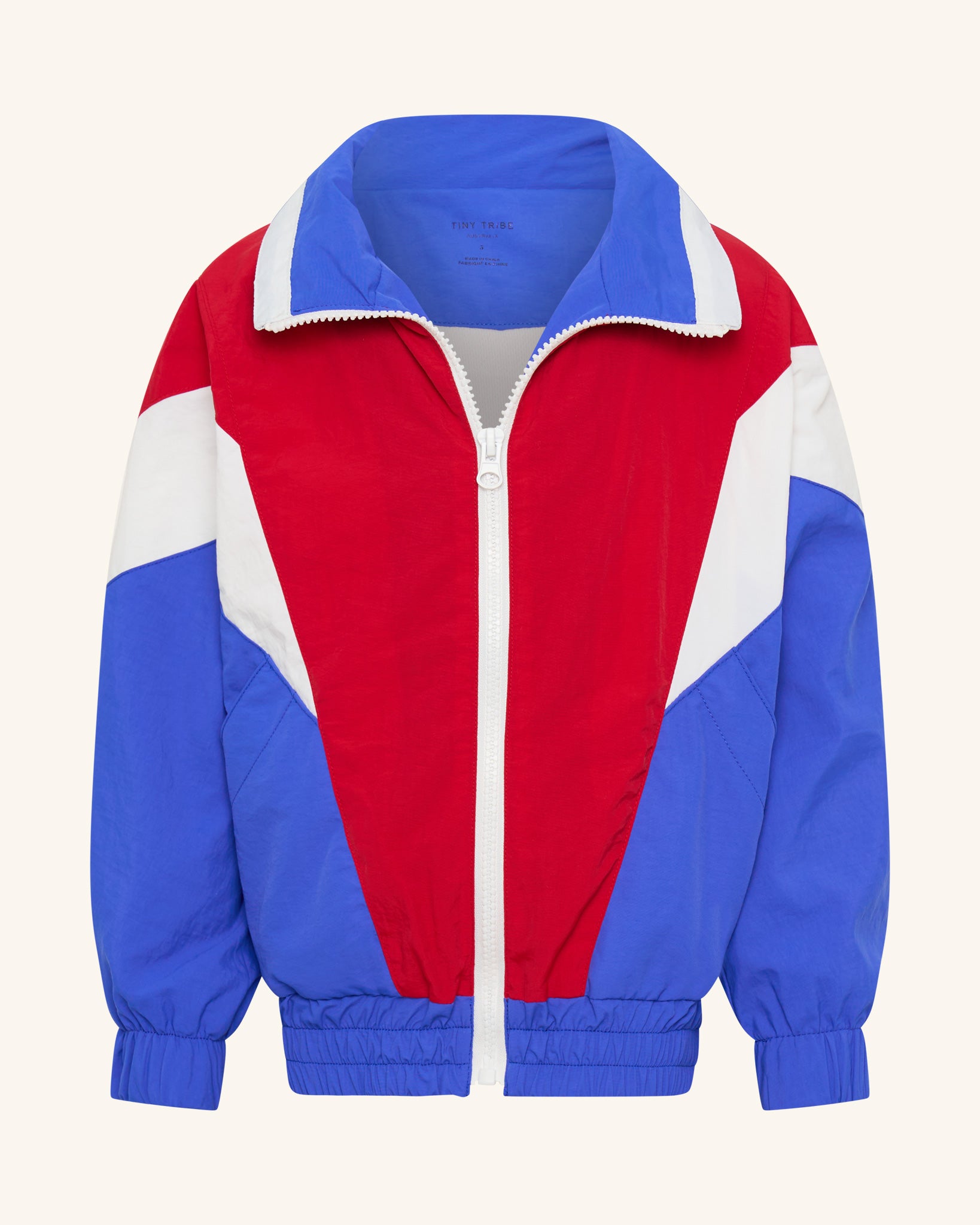 Veste bleue et rouge segmentée