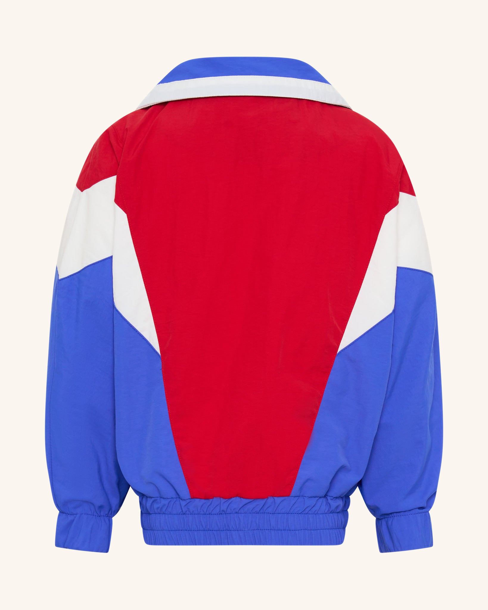 Veste bleue et rouge segmentée