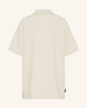 Chemise grise boutonnée avec poche