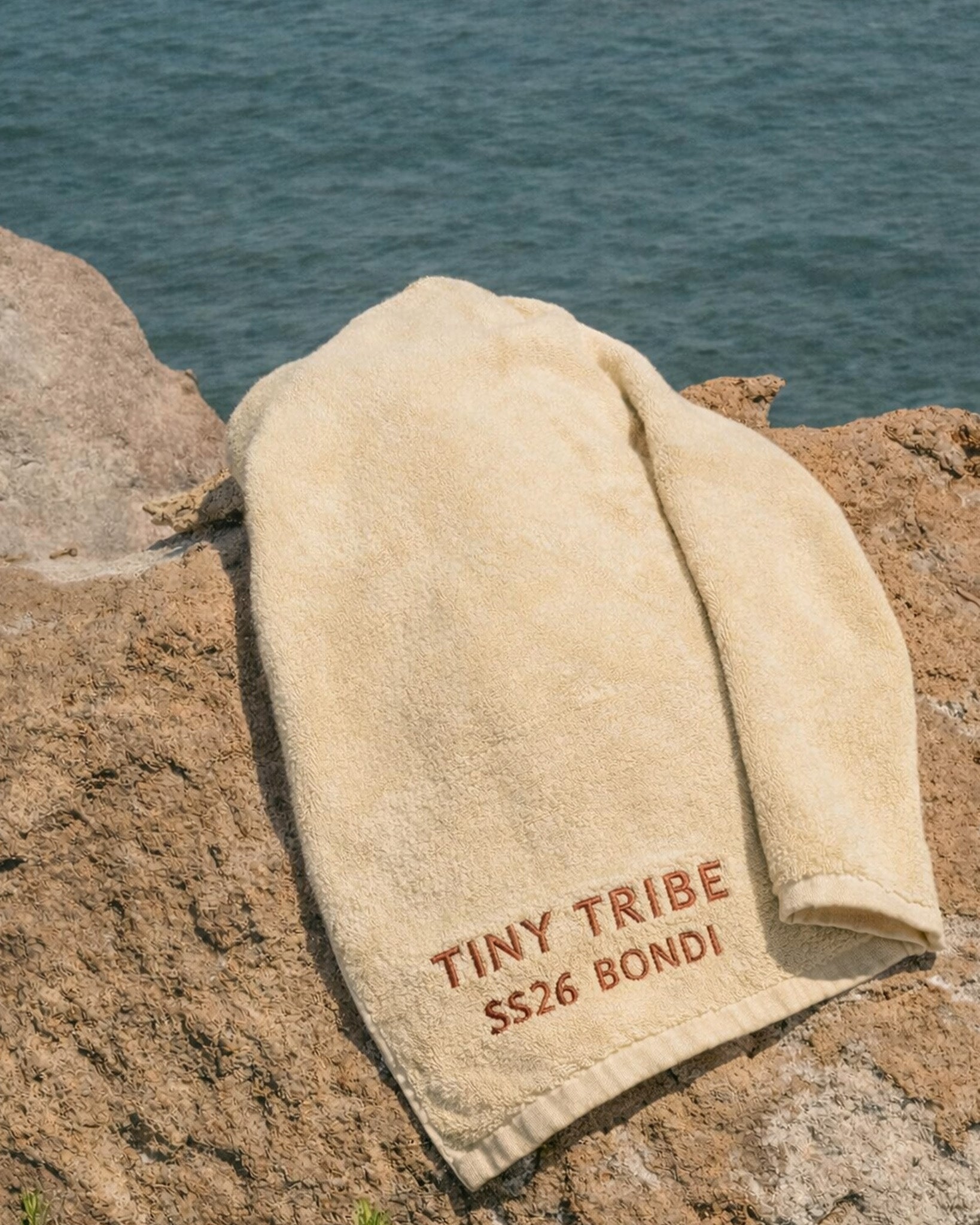 website_0003_TINY_TRIBE_TOWEL_ON_ROCK.jpg